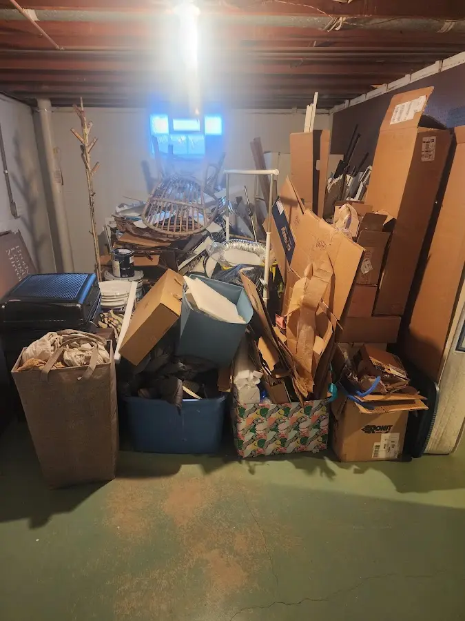 Roll-off dumpster container at job site for 2 Yard Dumpster Rental in Stanton